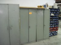 Description: (3) Storage cabinets and shelf  -BidSpotter live internet auctions and auctioneers